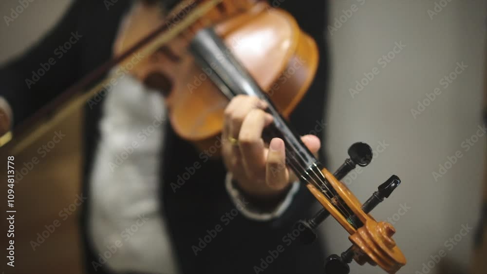 Cinematic Close-up Musician playing Violin at classical concert