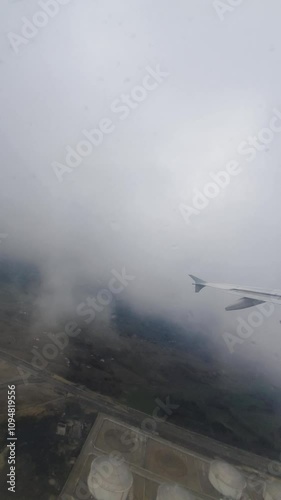 takeoff by airbus a310 from istanbul international airport in rainy weather from airplane window, Turkey photo