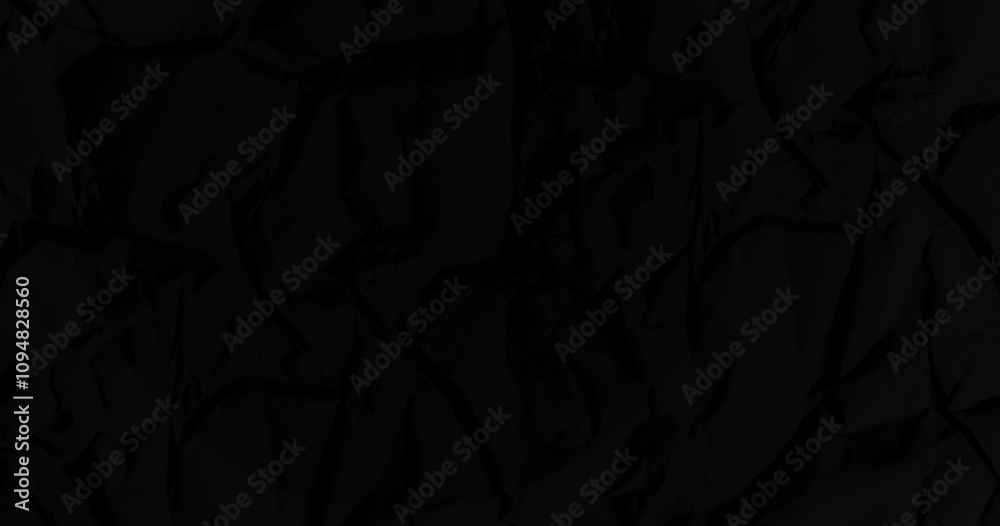 Black crumpled paper texture background Black crumpled paper texture background
