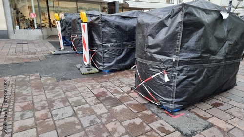 mobile road barricade on street in the town photo