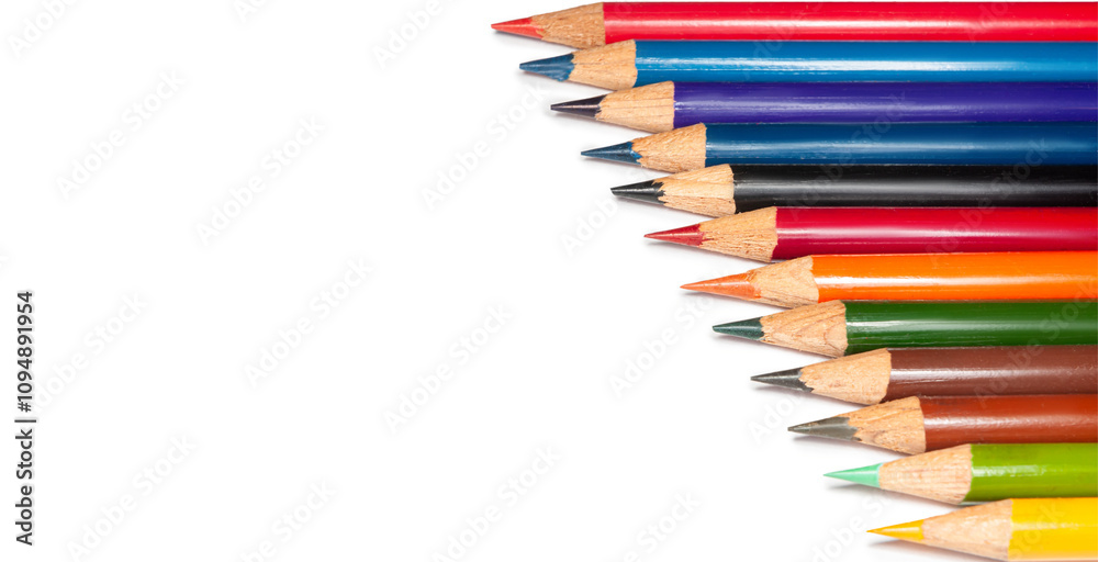 A vibrant collection of colored pencils arranged artistically for drawing and coloring projects, showcasing a variety of shades on a clean white background A vibrant collection of colored pencils arranged artistically for drawing and coloring projects, showcasing a variety of shades on a clean white background