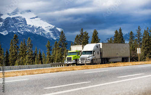 Heavy Cargo on the Road. A truck hauling freight along a highway. Taken in Alberta, Canada