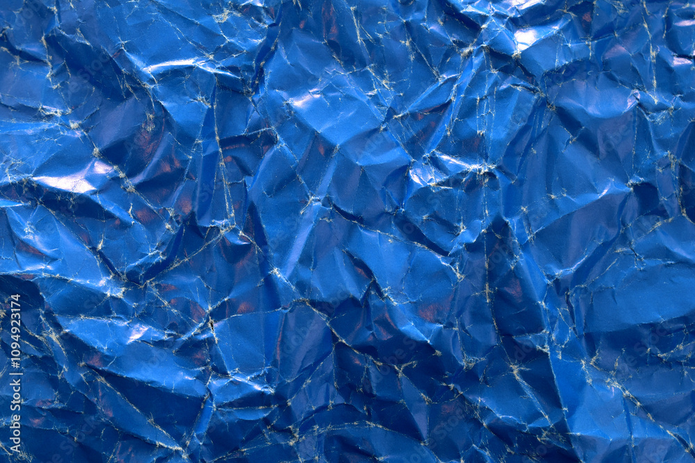 Background and texture of crumpled blue paper sheet. Background and texture of crumpled blue paper sheet.
