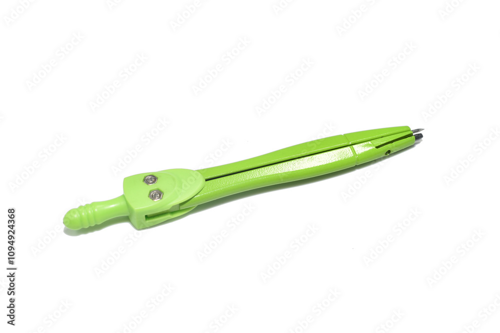 The school compass is made of green plastic. The school compass is made of green plastic.