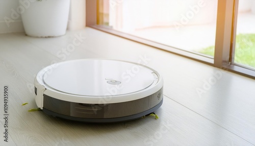  Robot vacuum cleaner operating in a bright indoor space photo