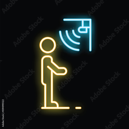 Bright glowing neon sign of a man standing in front of an automatic hand dryer on a black background