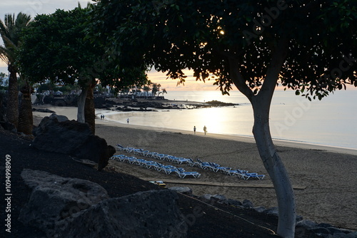 sunrise, playa grande, puerto del carmen, november 2024, sonya6000, beach, volcanic islands, black rocks, atlantic ocean photo