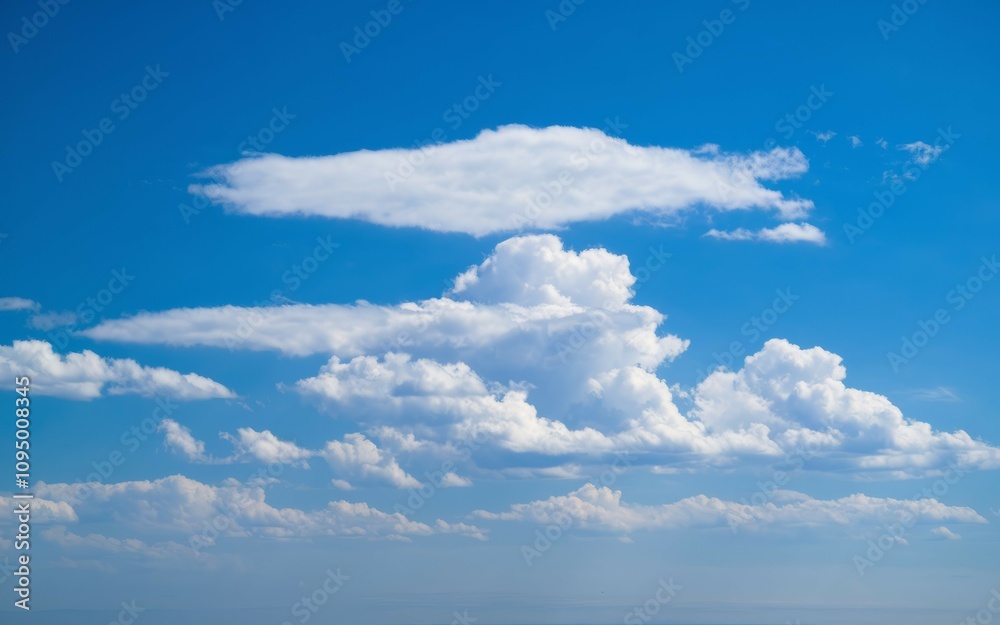 Blue sky fluffy cloudscape. Peaceful cloudscape evokes serenity, freedom, and hope; a beautiful summer day. Blue sky fluffy cloudscape. Peaceful cloudscape evokes serenity, freedom, and hope; a beautiful summer day.