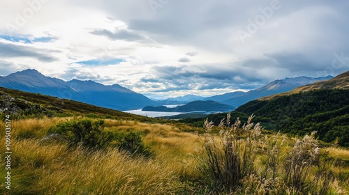 A beautiful landscape with a lake and mountains in the background