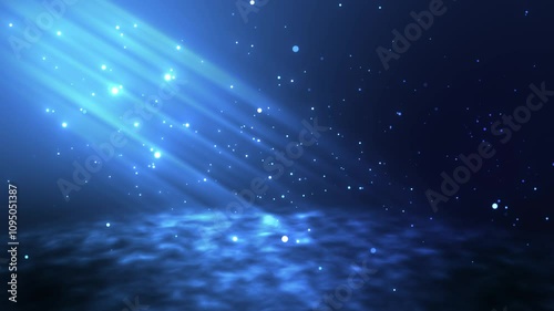 Glowing blue particles on a blue background with a ray of light at the top. Animation of the underwater bottom with light and particles breaking through