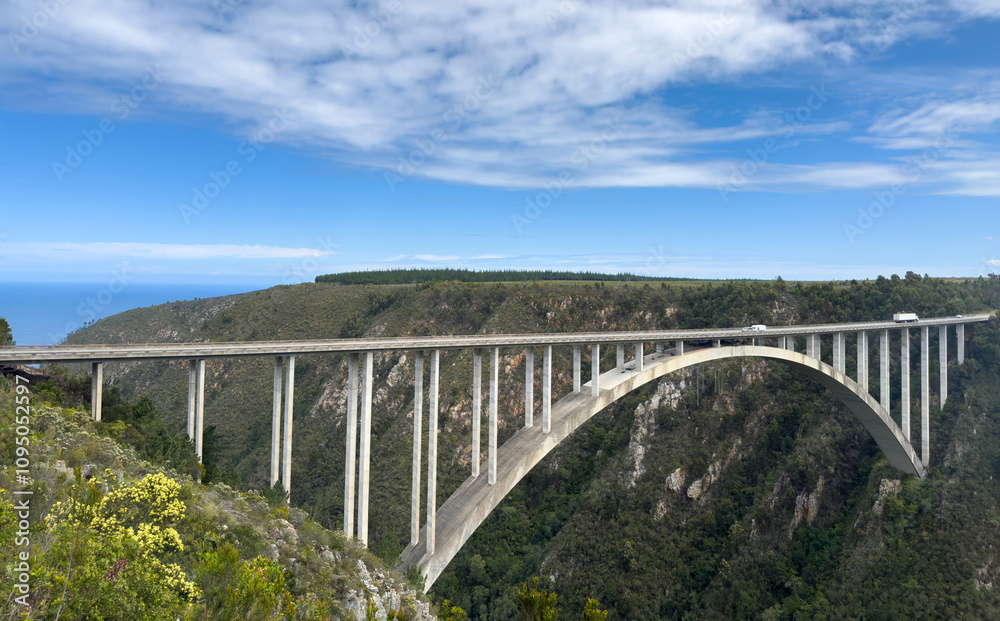 Bloukrans Bridge along the Garden Route in South Africa. An arch bridge famous for bungee jumping Bloukrans Bridge along the Garden Route in South Africa. An arch bridge famous for bungee jumping