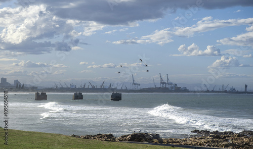 Port Elizabeth or Gqeberha, South Africa. view from shark rock pier, cloudy blue sky