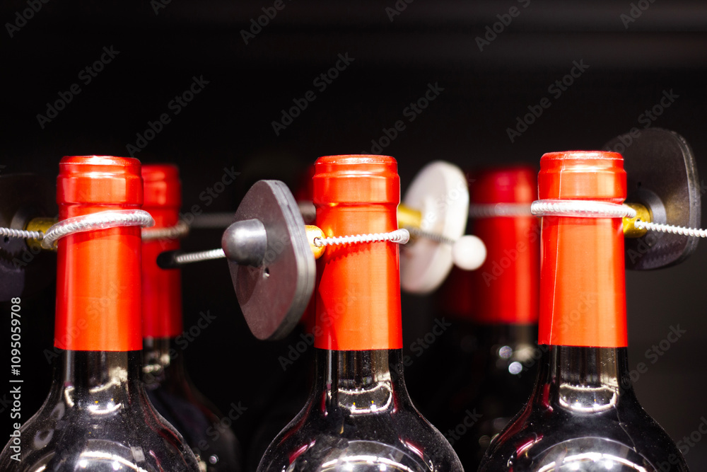 Anti-theft system for alcohol bottles.