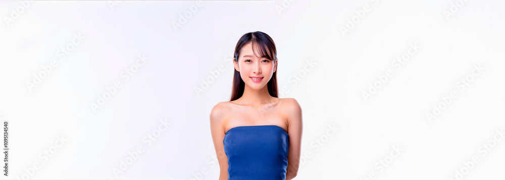 A smiling East Asian woman wearing a blue tube top. A smiling East Asian woman wearing a blue tube top.