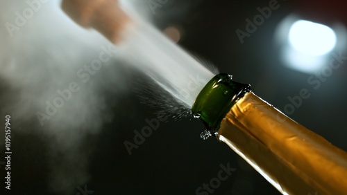 Freeze motion of Champagne explosion with flying cork closure, opening champa...