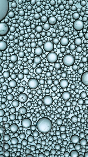 Macro Shot of Moving Oil Bu...