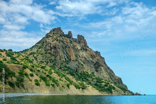 Eastern part of Crimean Mountains. Karadag volcano with basalt lava remnants (stone pillars) 150 million years ago as manifestation of Middle Jurassic volcanism, eolian erosion. Black Sea photo