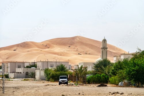 Canvas Print Al Ain oasis in the red desert. Modern look. Emirate of Abu Dhabi