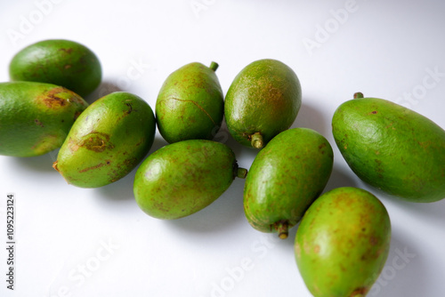 Wallpaper Mural Matoa fruit or Pometia pinnata has a sweet taste and delicious flesh. isolated white background Torontodigital.ca