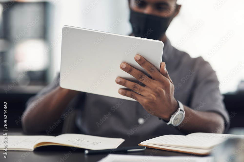 Office, hands and man with tablet for research, review information and business for digital agency. Career, worker and graphic designer with design application, notebook or face mask for virus safety Office, hands and man with tablet for research, review information and business for digital agency. Career, worker and graphic designer with design application, notebook or face mask for virus safety