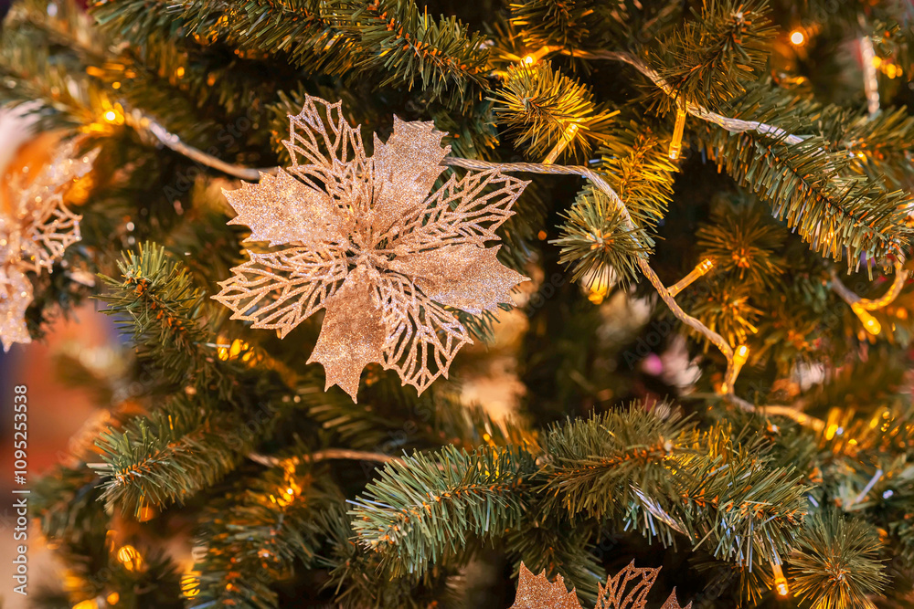 Decorated Christmas tree featuring golden floral ornaments, warm glowing lights. Abstract festive background for design Decorated Christmas tree featuring golden floral ornaments, warm glowing lights. Abstract festive background for design