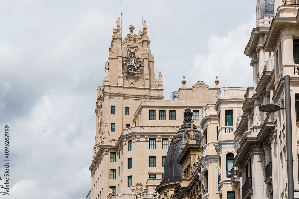 Fototapeta premium Old Luxury Residential Buildings in Gran Via and Barquillo area in Central Madrid