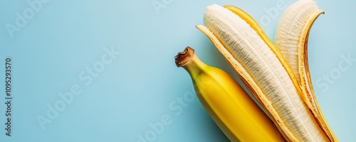 A partially peeled banana, with the contrast of smooth inner surface and textured peel, peeled banana, dual texture study photo