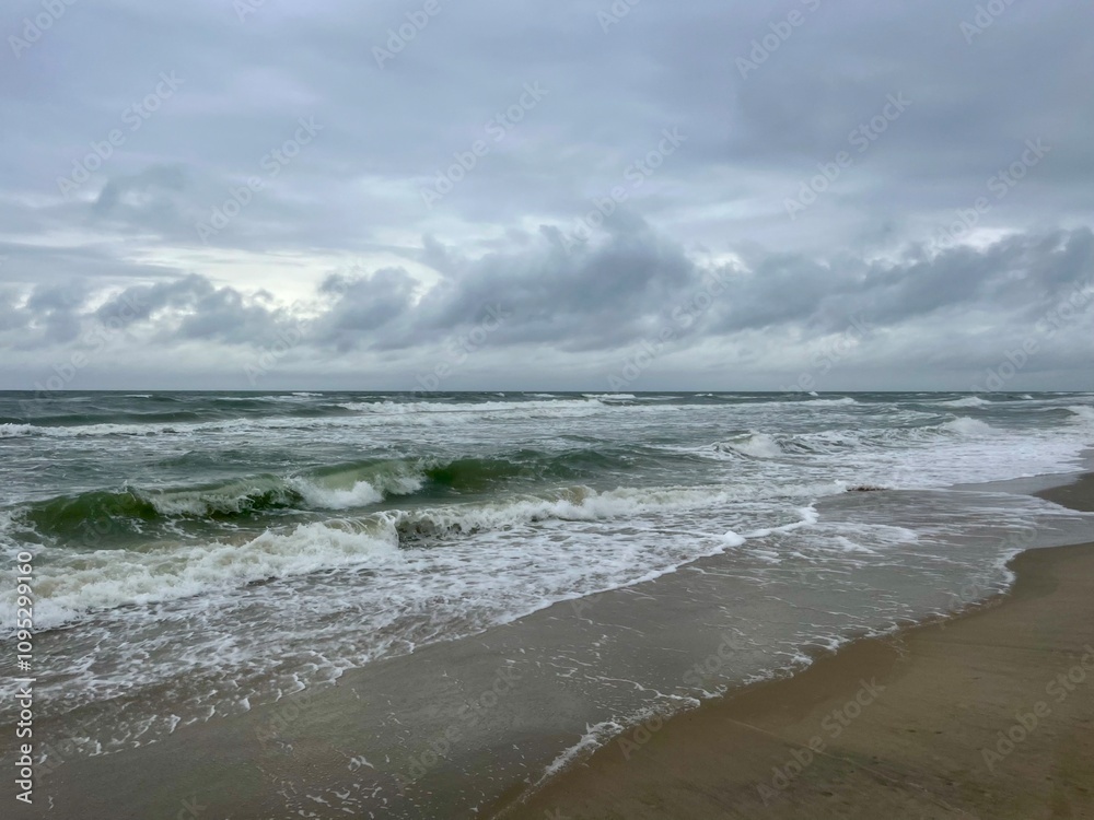 cloudy seascape, sandy shore, empty wild beach, clouds and waves cloudy seascape, sandy shore, empty wild beach, clouds and waves