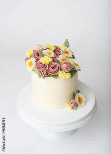 white cake with buttercream flowers