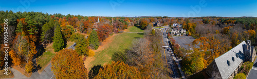 Weston historic town center aerial view including Town Hall at Lanson Park and First Parish Church in fall with foliage, Weston, Massachusetts MA, USA.   photo