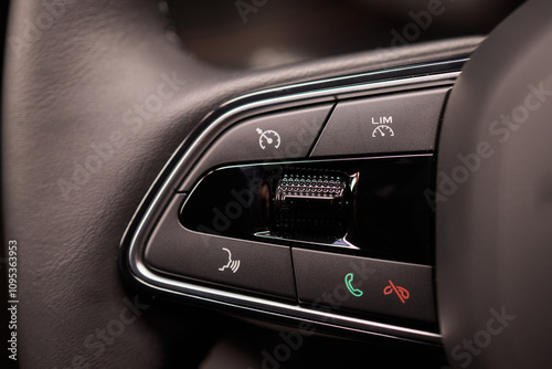 The modern cars steering wheel control panel boosts convenience and performance