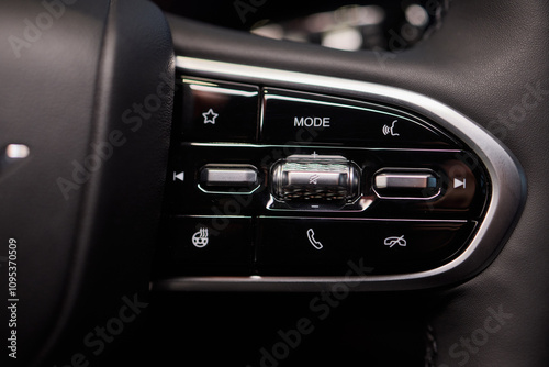 The modern cars steering wheel control panel boosts convenience and performance photo