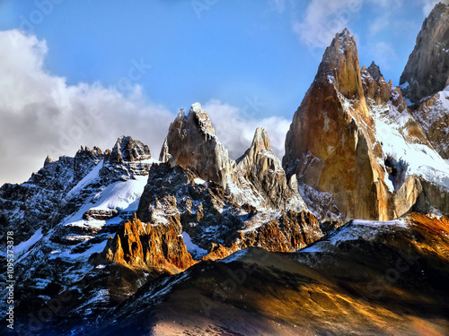 patagonian rugged mountain landscape with high peaks at sunset photo