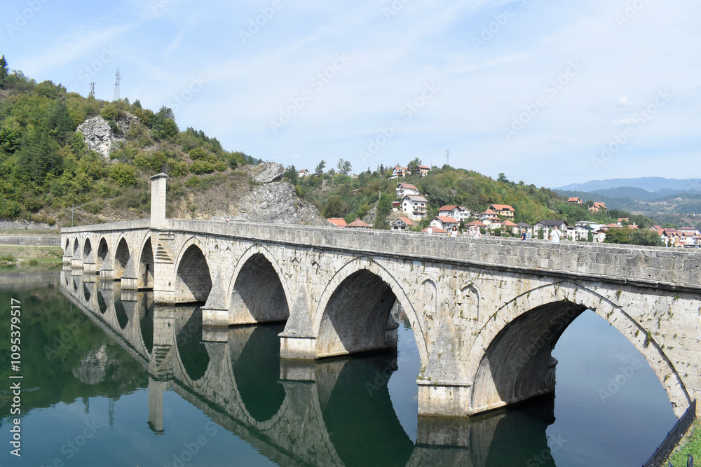 Fototapeta premium The bridge on the Drina River, famous historic Ottoman architecture in Visegrad, Bosnia and Herzegovina.