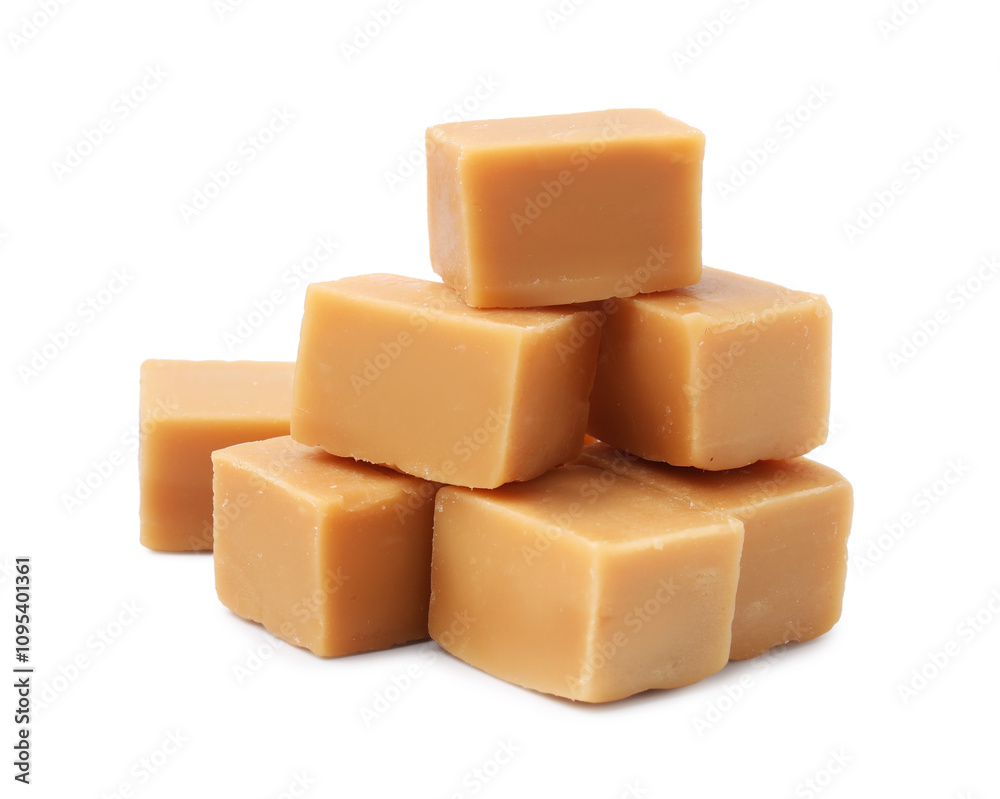 Tasty sweet caramel candies isolated on white Tasty sweet caramel candies isolated on white