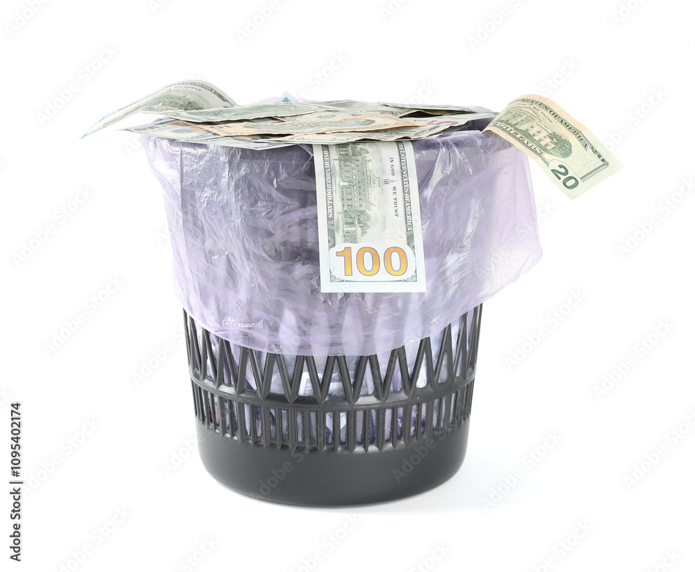 Many dollar banknotes in trash bin isolated on white Many dollar banknotes in trash bin isolated on white