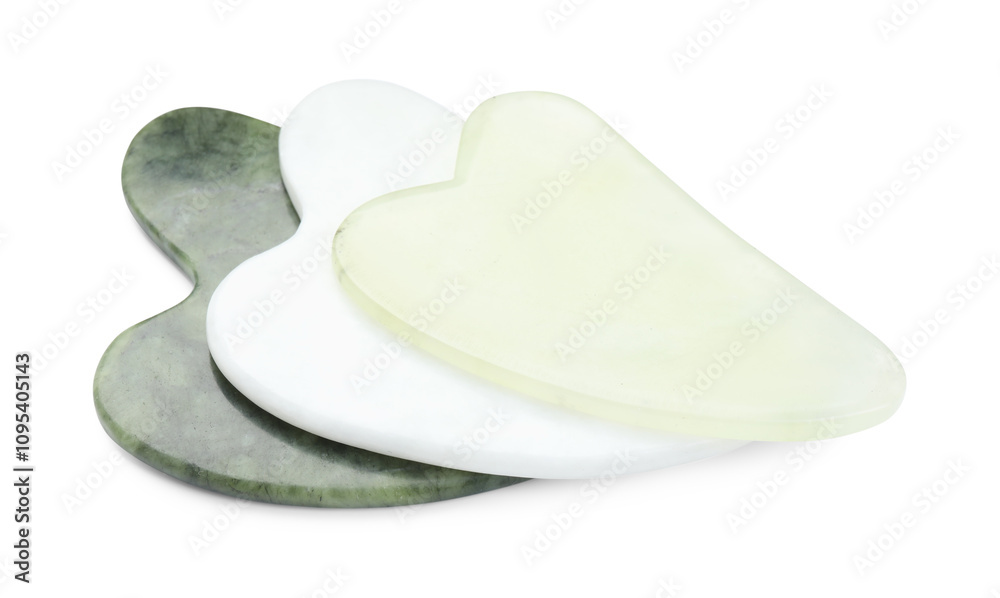 Different gua sha tools isolated on white Different gua sha tools isolated on white