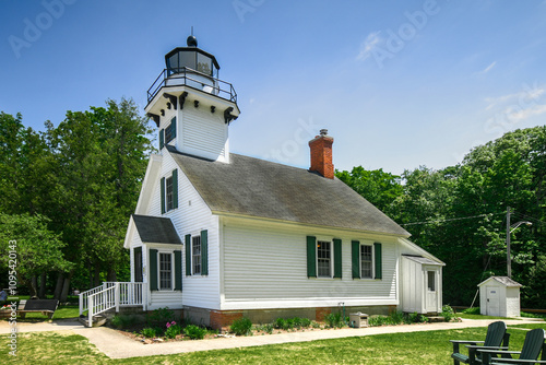 Publicly owned by Peninsula Township, Michigan: Mission Point Lighthouse in the summer. 