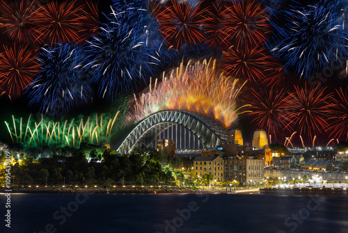 Canvas Print Sydney Harbour Bridge New Years Eve fireworks, colourful NYE fire works lighting the night skies with vivid multi colours NSW Australia
