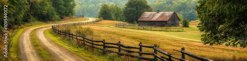 An old wooden fence, weathered by time, stands along a winding dirt road, leading to a quaint country barn. photo