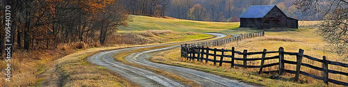 An old wooden fence, weathered by time, stands along a winding dirt road, leading to a quaint country barn. photo