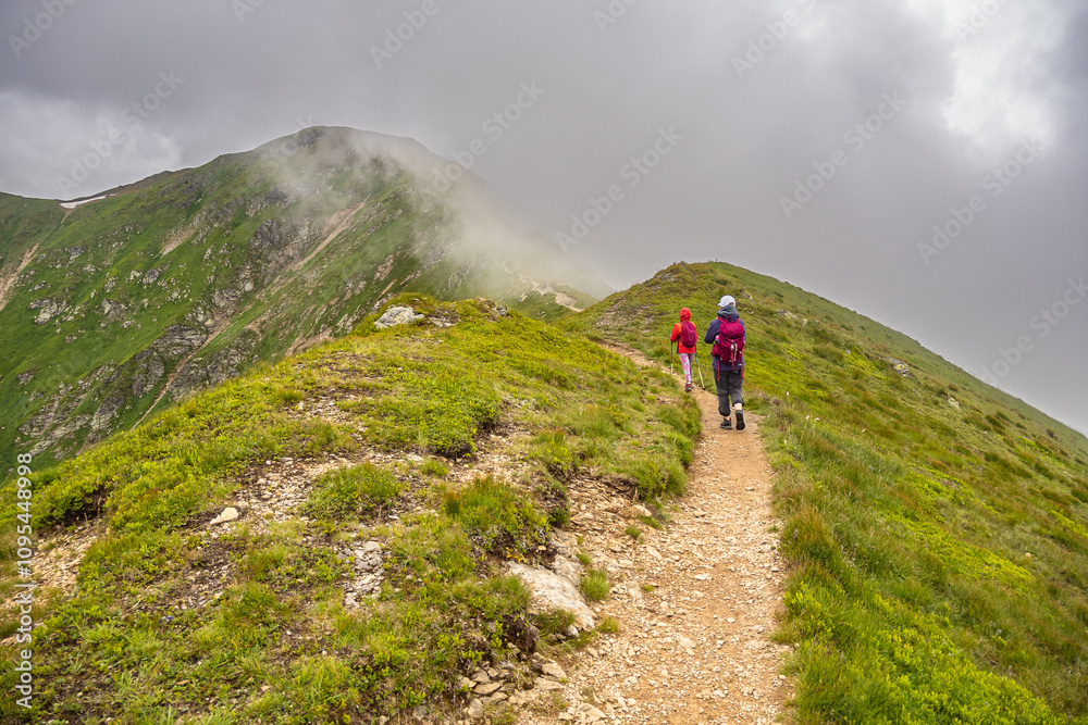 hiking in the mountains, on the trail to Jarzębczy Wierch - a peak in the Polish Western Tatras