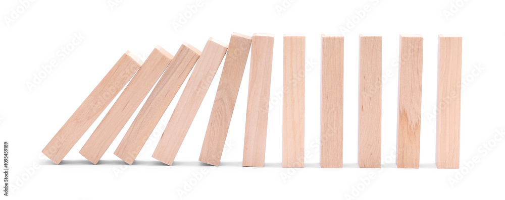 Domino effect. Wooden blocks falling on white background Domino effect. Wooden blocks falling on white background