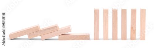 Domino effect. Wooden blocks falling on white background