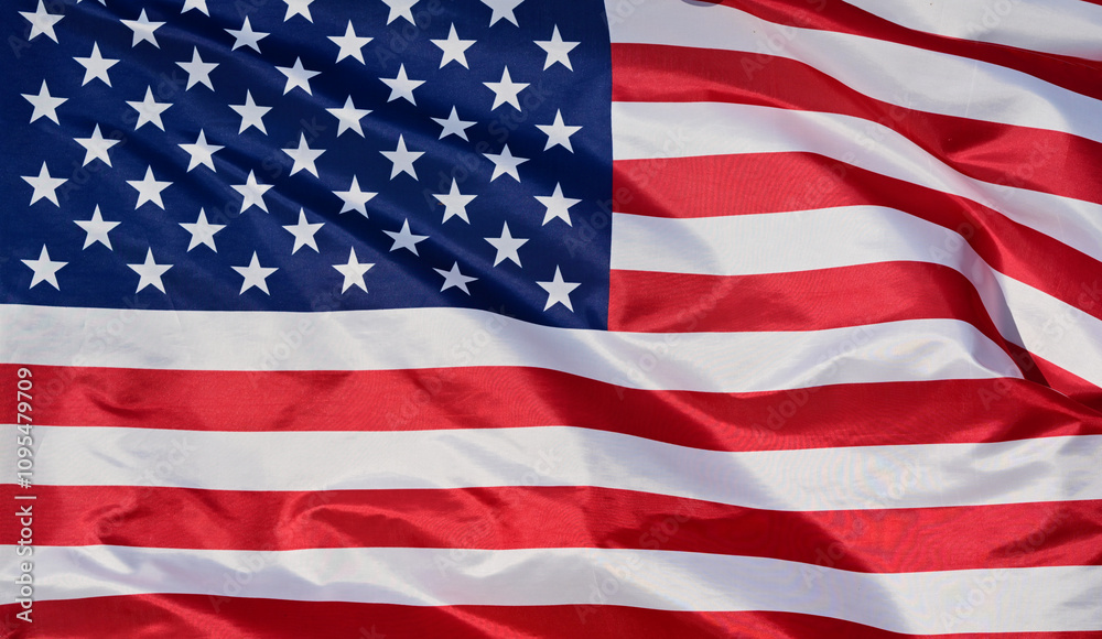 Naklejka premium Close-up of the national flag of The United States, fluttering in the wind with folds, wave pattern