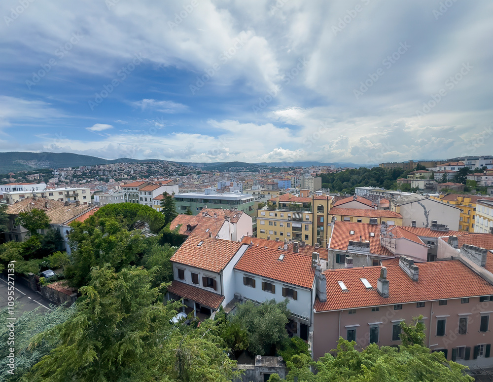 Trieste, Italy - June 27, 2024: Historic San Giusto castle. Cityscape looking out from ramparts Trieste, Italy - June 27, 2024: Historic San Giusto castle. Cityscape looking out from ramparts