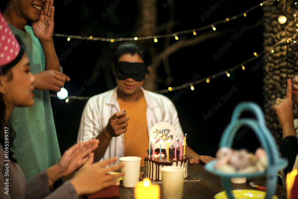 Fototapeta premium Celebration at Night Birthday Party with Friends