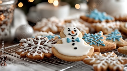 A perfect collection of winter-themed cookies featuring a cheerful snowman and intricate snowflake designs, decorated with vibrant icing for a sweet treat. photo