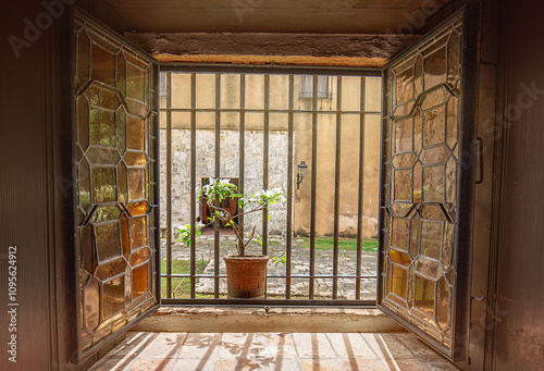 View to the yard of medieval house from the window