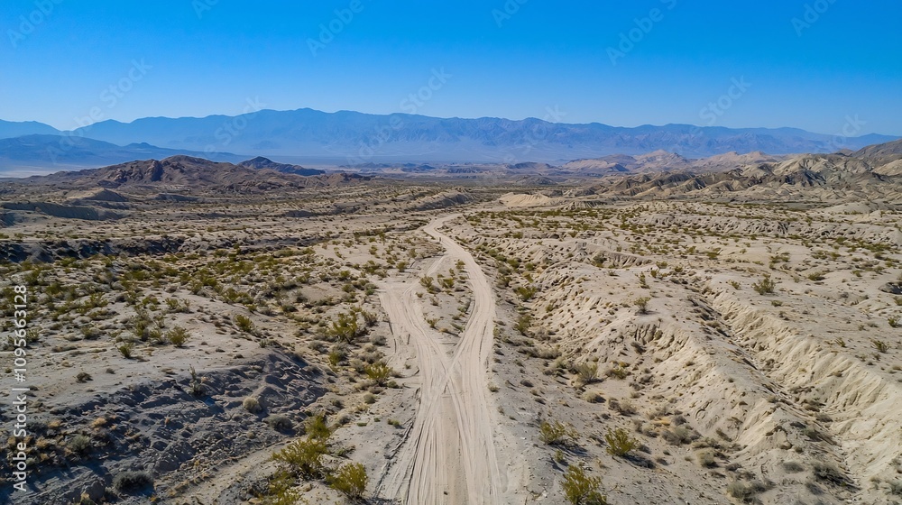 Breathtaking drone captured image of a serene desert landscape with undulating sand dunes and a clear cloudless blue sky This expansive Breathtaking drone captured image of a serene desert landscape with undulating sand dunes and a clear cloudless blue sky This expansive